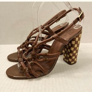 Tory Burch brown leather woven rope.  These heels are fabulous 💖